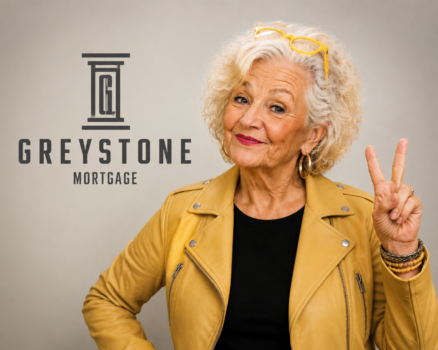 Greystone Mortgage loan advisor holding up two fingers